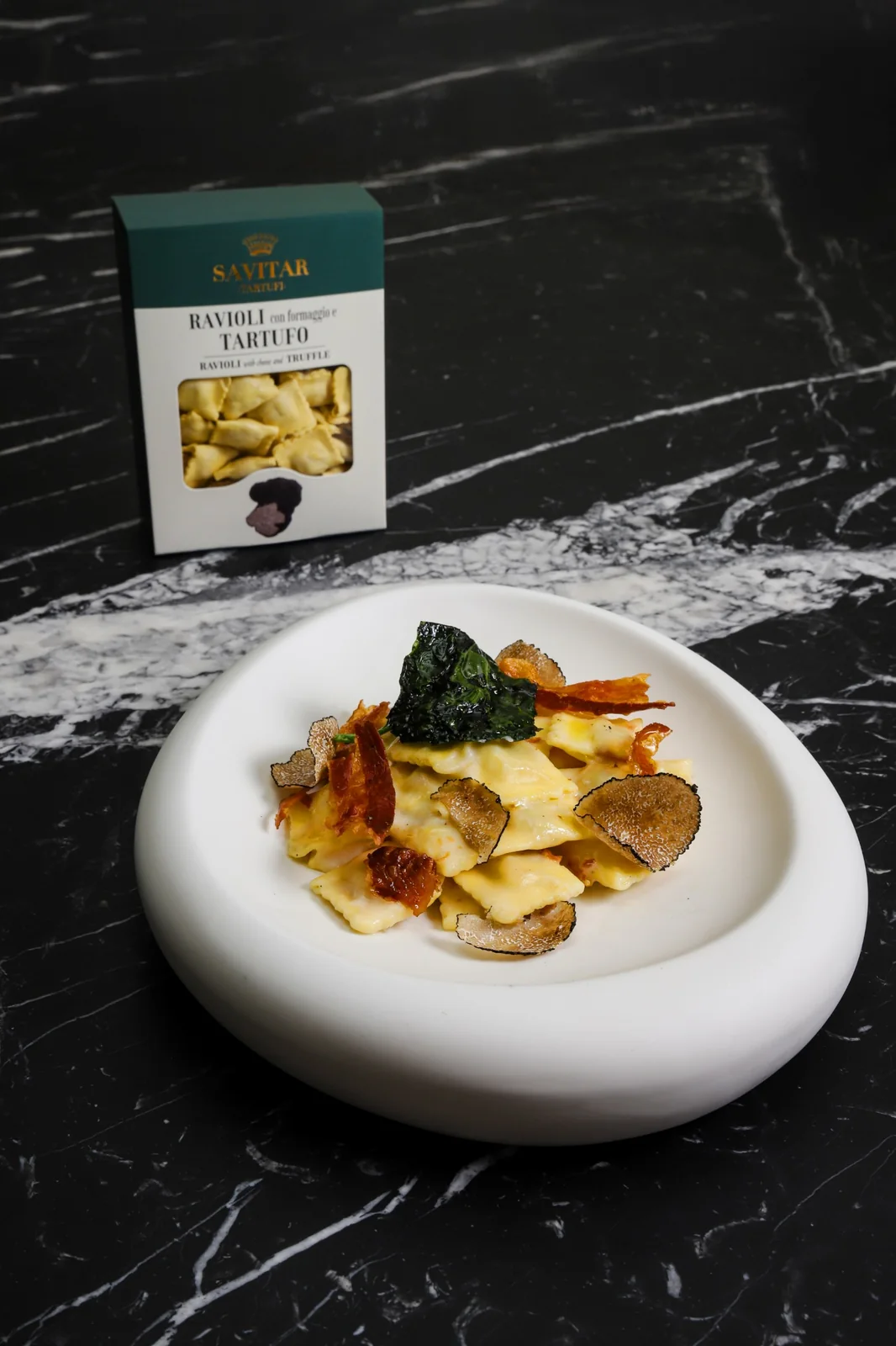 Ravioli al tartufo con cavolo nero e rigatino